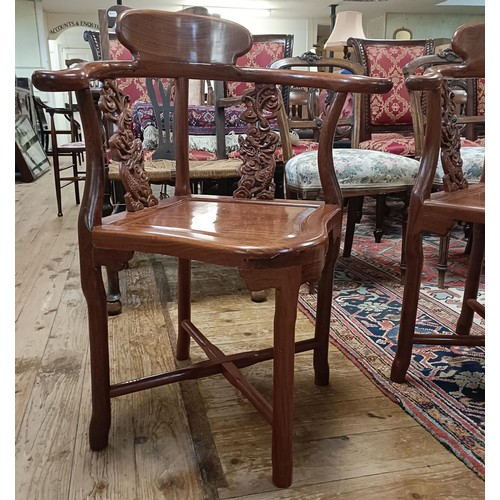 884 - A pair of Chinese hardwood corner chairs (2)