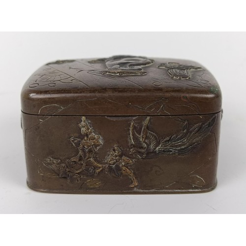 1003 - A Japanese bronze box, decorated birds, 6 cm wide...