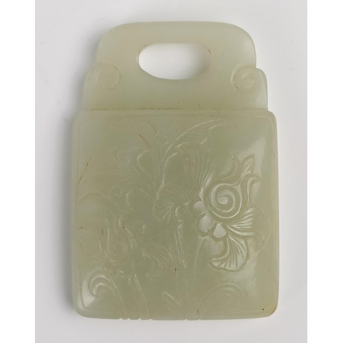 1005 - A Chinese carved pale green stone plaque, 6 x 5 cm...