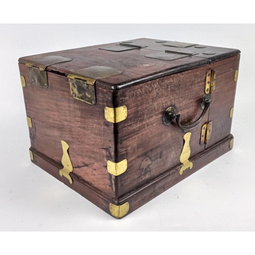 1009 - A Chinese hardwood and metal bound dressing chest, 23 cm wide