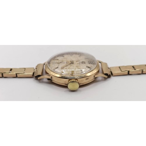 651 - A ladies 9ct gold wristwatch, on a gold plated strap, two other ladies wristwatches, and a vintage w... 