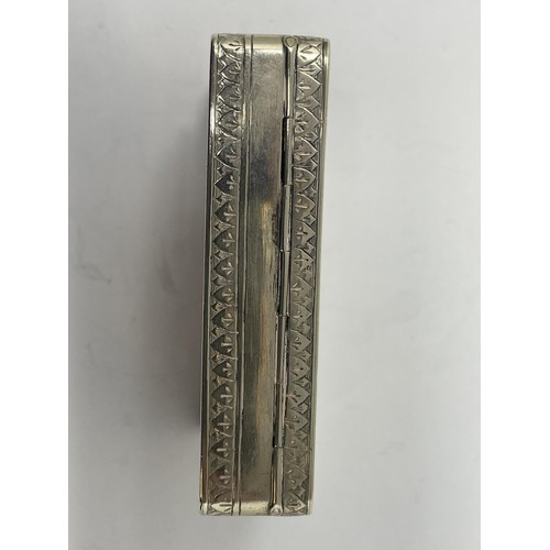 206 - A silver coloured snuff box, decorated a hunting scene, 9 cm wide, 109 g