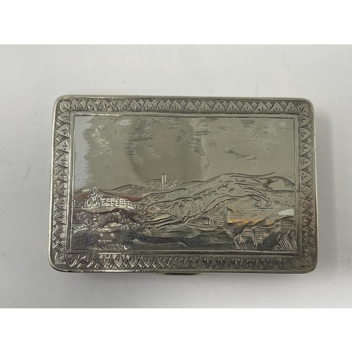 206 - A silver coloured snuff box, decorated a hunting scene, 9 cm wide, 109 g