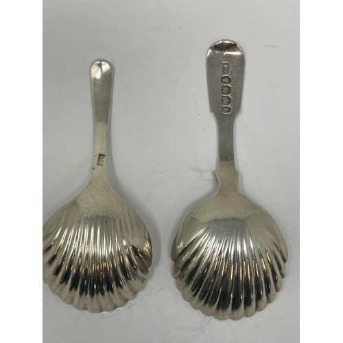 201 - A Victorian silver fiddle pattern teaspoon, and a silver coloured metal caddy spoon (2)