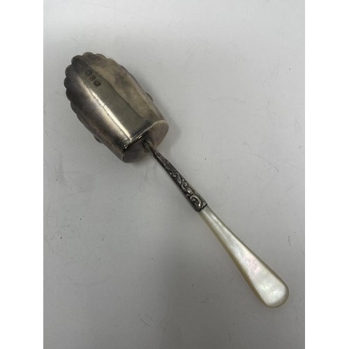 197 - A Victorian silver and mother of pearl caddy spoon, Birmingham 1895