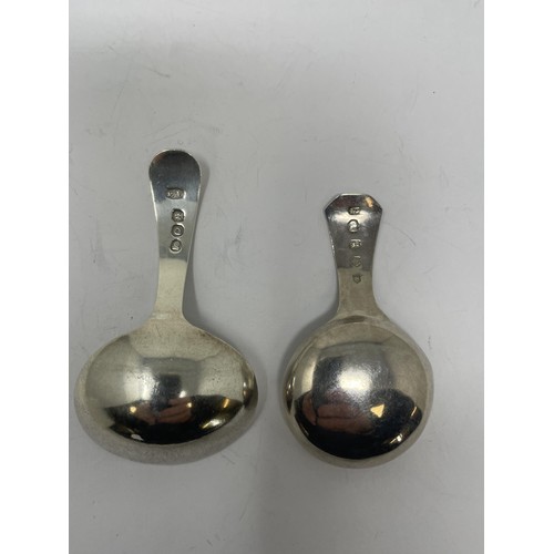 196 - A George III silver caddy spoon, and another (2)