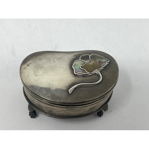 193 - A George V silver and mother of pearl kidney shape dressing table box, Birmingham 1911, 6.5 cm wide