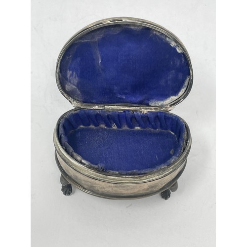 193 - A George V silver and mother of pearl kidney shape dressing table box, Birmingham 1911, 6.5 cm wide