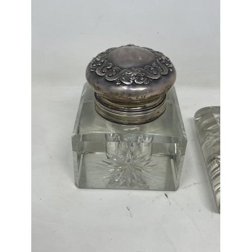 180 - A cut glass inkwell, with silver mounts, and four others (5)