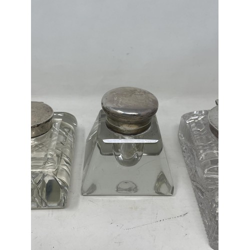 180 - A cut glass inkwell, with silver mounts, and four others (5)