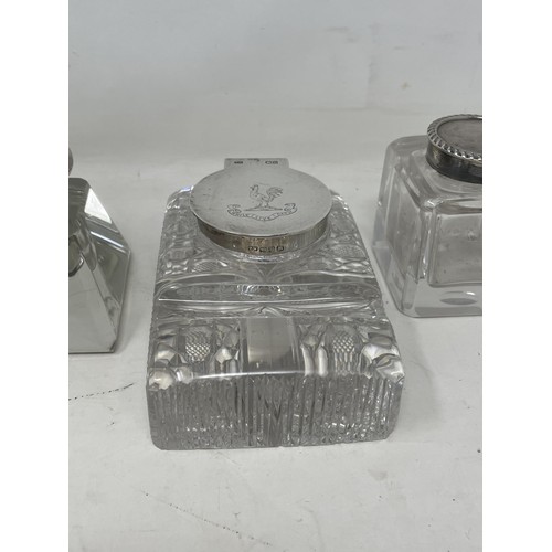 180 - A cut glass inkwell, with silver mounts, and four others (5)