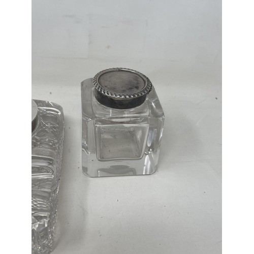 180 - A cut glass inkwell, with silver mounts, and four others (5)