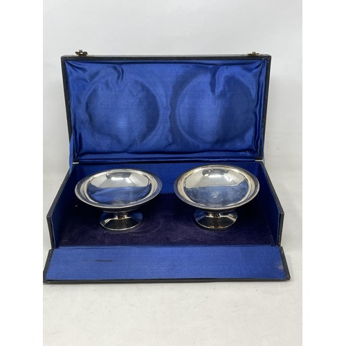 35 - A pair of silver plated stands, cased, and assorted silver plate (box)...