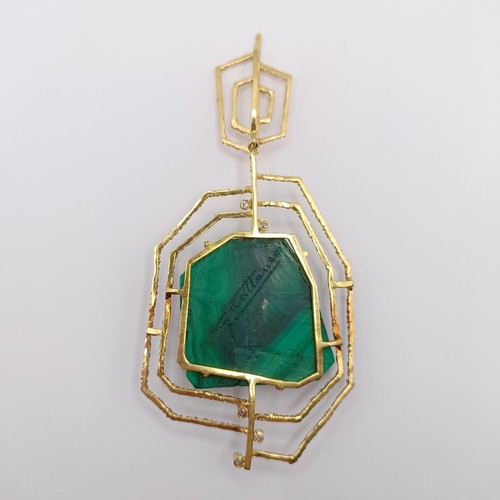 399 - An 18ct gold, diamond and malachite cameo pendant, carved a portrait