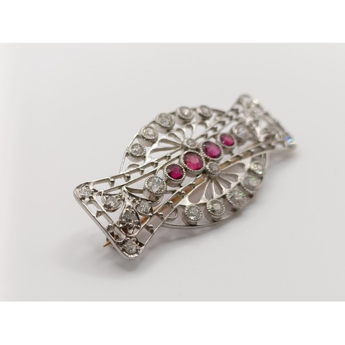 408 - A ruby and diamond brooch