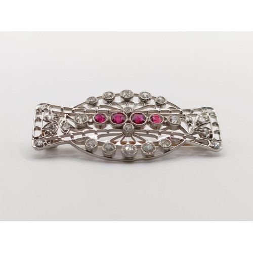 408 - A ruby and diamond brooch