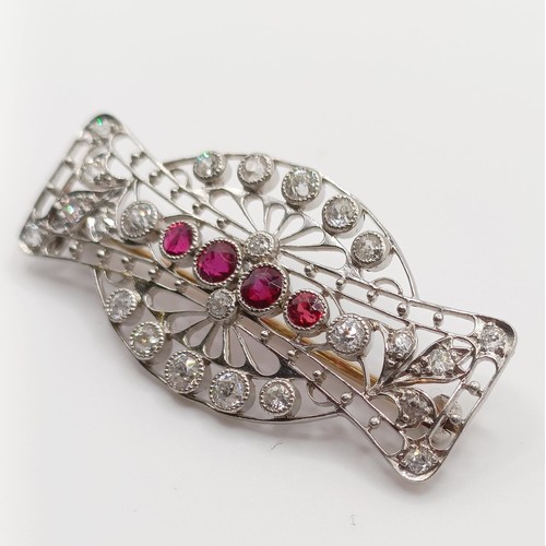 408 - A ruby and diamond brooch