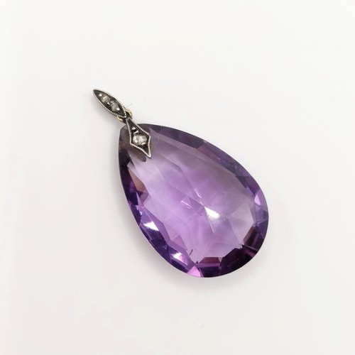 410 - An amethyst and diamond pendant