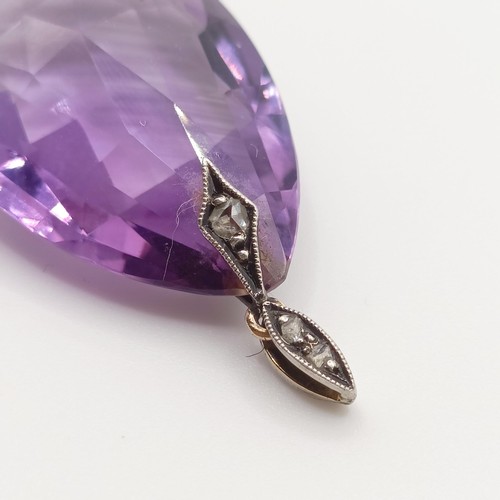 410 - An amethyst and diamond pendant