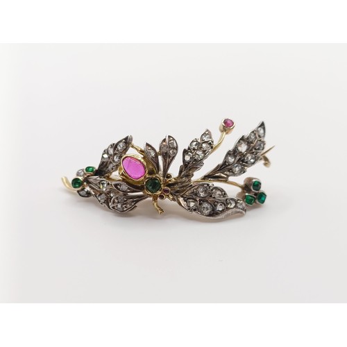 419 - A diamond and multi-coloured gem floral brooch, decorated an insect