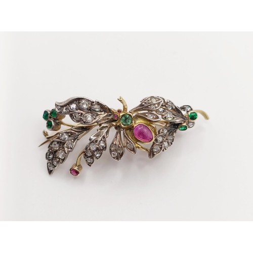 419 - A diamond and multi-coloured gem floral brooch, decorated an insect