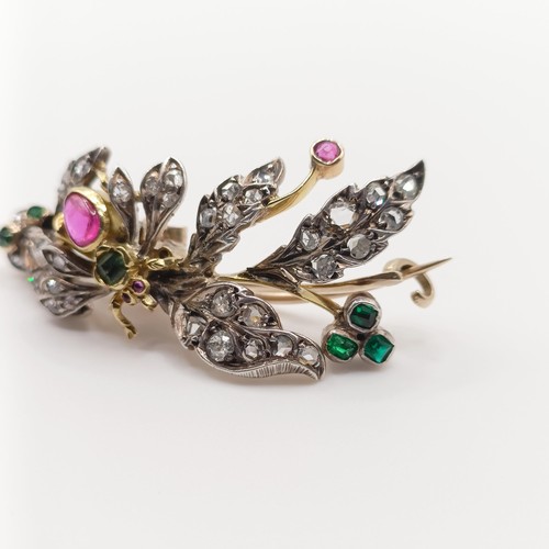 419 - A diamond and multi-coloured gem floral brooch, decorated an insect