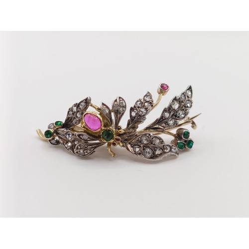 419 - A diamond and multi-coloured gem floral brooch, decorated an insect