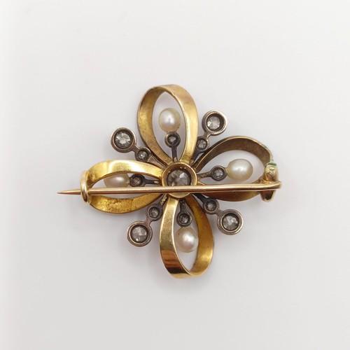 431 - A diamond and enamel brooch