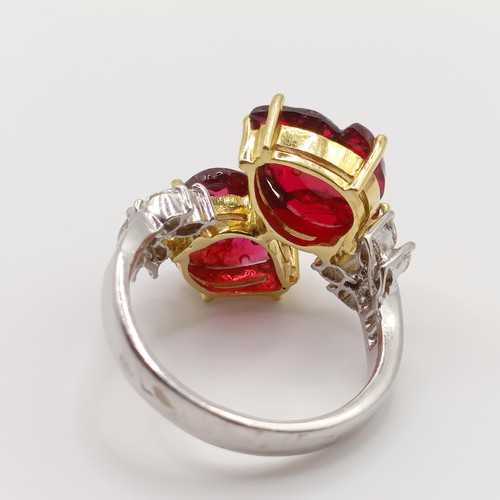 421 - A French diamond and carved red stone ring, ring size O