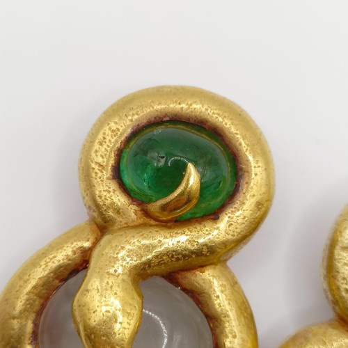 409 - A pair of 22ct gold and cabochon emerald and grey stone snake earrings