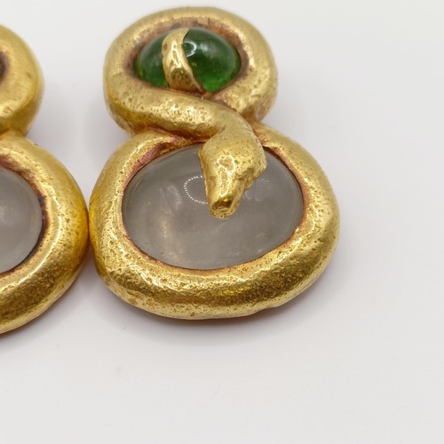 409 - A pair of 22ct gold and cabochon emerald and grey stone snake earrings