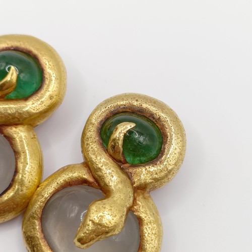 409 - A pair of 22ct gold and cabochon emerald and grey stone snake earrings