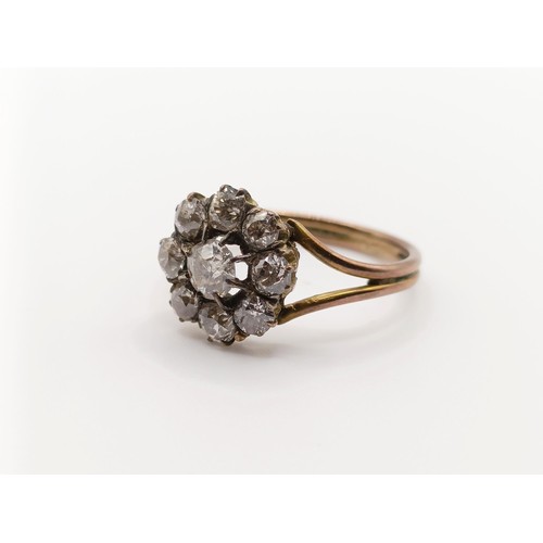 465 - A diamond cluster ring, central diamond, 0.3ct approx., ring size O