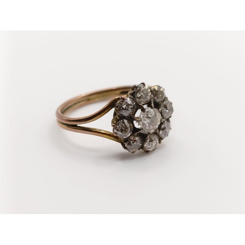 465 - A diamond cluster ring, central diamond, 0.3ct approx., ring size O