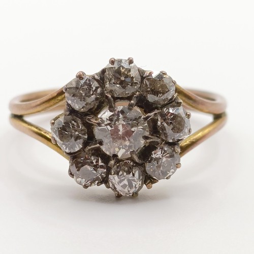 465 - A diamond cluster ring, central diamond, 0.3ct approx., ring size O