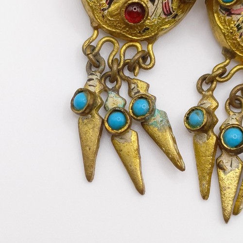 479 - A pair of Indian yellow coloured metal, turquoise, red stone and enamel tassel earrings