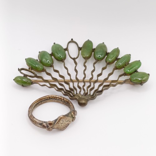 475 - An antique silver ring, and a yellow metal and green stone fan brooch, lacking two stones (2)