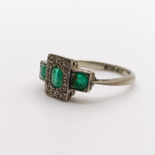 471 - An 18ct gold, platinum, emerald and diamond ring, ring size K