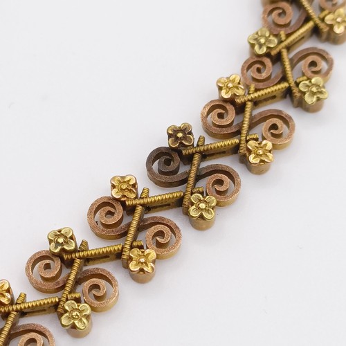 476 - An early 20th century multi-coloured yellow coloured metal fancy bracelet, testing as high carat gol... 