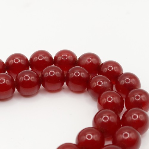 470 - A red amber bead necklace, 24.1 g