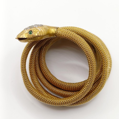 463 - A late 19th/early 20th century Indian yellow coloured metal, old cut diamond and green stone snake b... 