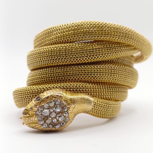 463 - A late 19th/early 20th century Indian yellow coloured metal, old cut diamond and green stone snake b... 