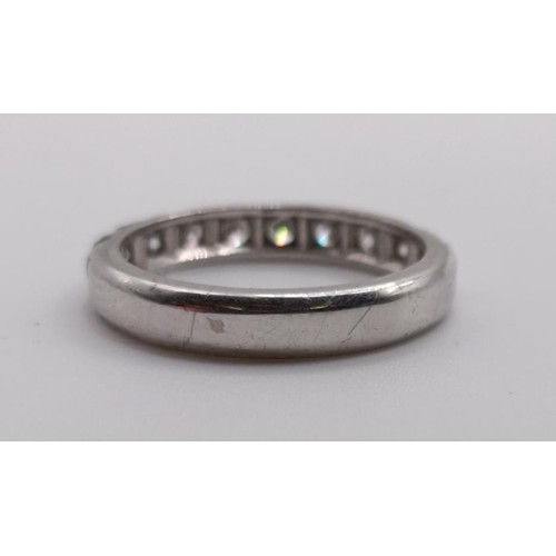 647 - A diamond half eternity ring, ring size M