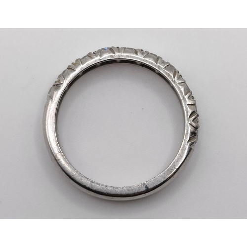 647 - A diamond half eternity ring, ring size M