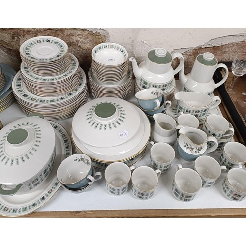 1116 - A Royal Doulton Tapestry pattern dinner service, a Royal Doulton Rose Elegans service, and a Royal D...