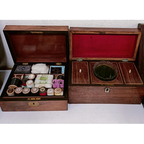 1129 - A 19th century mahogany and brass bound writing slope, 50 cm wide, a tea caddy, a work box, a writin...