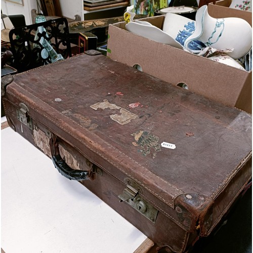 1129 - A 19th century mahogany and brass bound writing slope, 50 cm wide, a tea caddy, a work box, a writin...