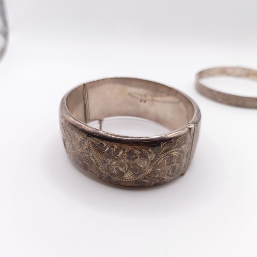 625 - A silver bangle, and two others, 73 g (3)