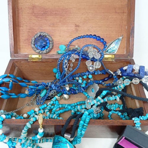 532 - A small mahogany box of turquoise and abalone shell jewellery, beads and brooches