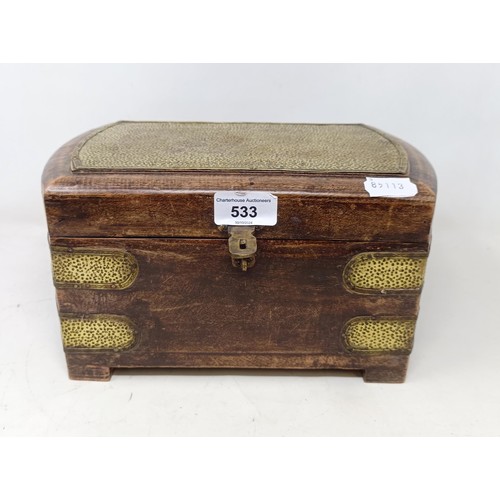 533 - A large brass bound wooden casket of semi-precious beads, including rose quartz, jade, malachite and... 